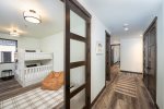 Bedroom 4 is a bunk room, offering full over full bunk beds with a twin trundle bed.